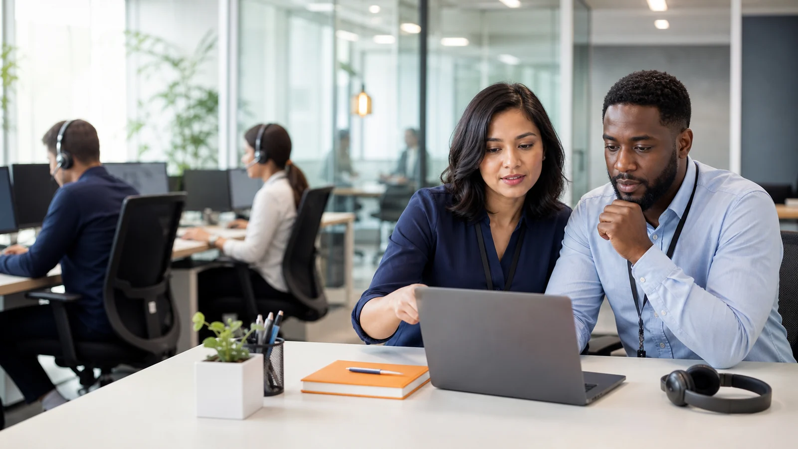 Customer service team coordinating support across phone, email and live chat